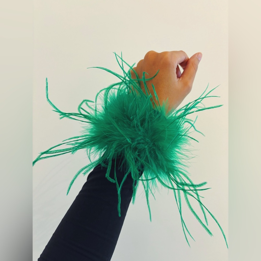 Feather cuffs made on slap bracelets